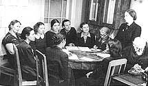 1950s.  Meeting of the Method Council. Nikolayeva T.V. (from the back),      Belobrova O.A., Bagayeva  I.I. Kruglova O.V., Baikova I.N. (Head of  the Scientific Propaganda Department),  Bureichenko I.I., Kurova T.N., Prasolova N.M., Mayasova N.A., Kalmykova L.E., Svirin A.N.