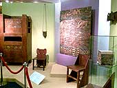 The items of the Sergiev  Posad Museum  in the hall of the exhibition (the cupboard door to the right)